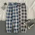 Pants Women New Bunch of feet Fashion Loose Black Plaid Summer Harajuku Students Streetwear Harem Long Trousers Womens Chic. 