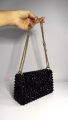 Black Pearl bag with chain or  handle. 