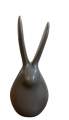 Decoration items (ceramic rabbit figurine showpiece). 