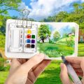 Portable Mini Watercolor Palette Set with Travel Sketchbook, Mixed Color Acrylic (PMMA) Paint Box for On-the-Go Art Creation. 