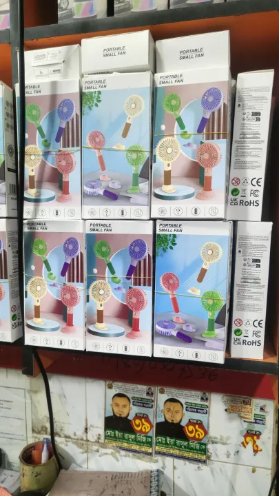 Portable%20Mini%20Rechargeable%20Handheld%20Fan%20with%20Stand%20%E2%80%93%20USB%20Charging,%20Adjustable%20Speeds,%20Compact%20and%20Travel-Friendly%20-%20Image%205