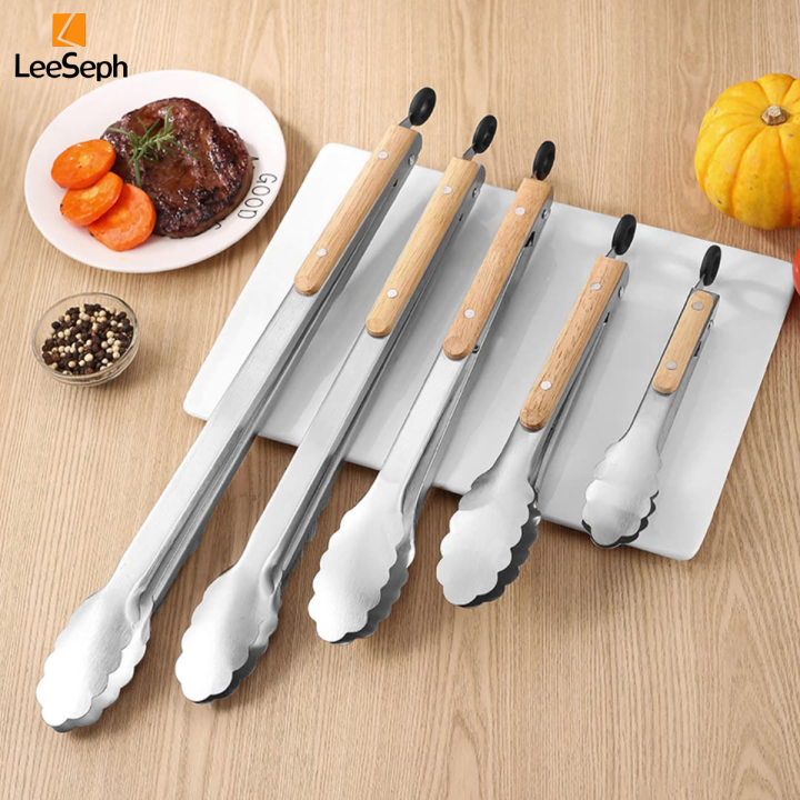 Leeseph%20Stainless%20Steel%20Food%20Tongs,%20Heavy%20Duty%20Kitchen%20Tongs%20with%20Wooden%20Handle%20for%20Cooking,%20Grilling%20and%20BBQ,%207-16%20Inch%20Length%20-%20Image%203