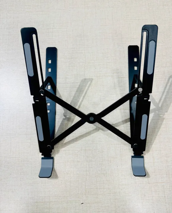 Portable%20Aluminum%20Foldable%20Laptop%20Metal%20Stand%20Adjustable%20Height%20Folding%20Laptop%20Holder%20Solid%20Stand%20With%20Anti%20Slip%20Rubber%20Grips%20-%20Silver%20-%20Image%208