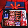 Gift box of chocolates and perfume. 
