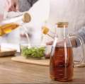 OIL JUG WITH WOODEN LID | AIR TIGHT WOODEN LID | 1000Ml , MEASURING OIL JUG | HIGH QUALITY BOROSILICATE MADE Glass | light in weight | can use in everyday kitchen utensils. 