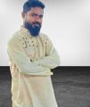 offwhite colour semilong ambrodary work panjabi.