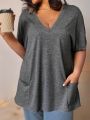 Plus Size Women's V-Neck Short Sleeve Casual T-Shirt with Front Pockets Comfortable and Stylish Top.