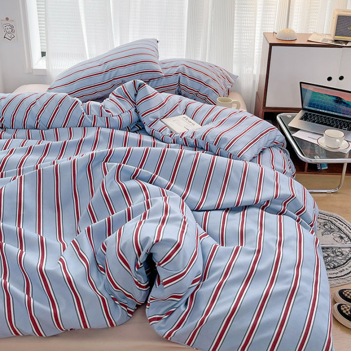 Simple%20Red%20and%20Blue%20Striped%20Duvet%20Cover%20and%20Four%20Piece%20Bed%20Sheet%20Set%20with%20Washed%20Cotton%20Bedding%20on%20the%20Bed%20-%20Image%205