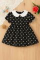 Stylish Black & White Polka Dot Dress for Girls – Classic Peter Pan Collar.