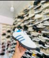 Adidas Samba OG Shoes: Classic White with Blue Stripes. 