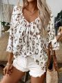 Plus Size Women Leopard Print Deep V-Neck Blouse Shirt Ladies 3/4 Sleeve Asymmetrical Shirt with Ruffled Hem & Ruched Detailing.