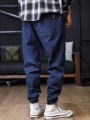 Plus Size Jeans Men Loose Joggers Streetwear Harem Jeans Cargo Pants Ankle-Length Denim Trousers. 