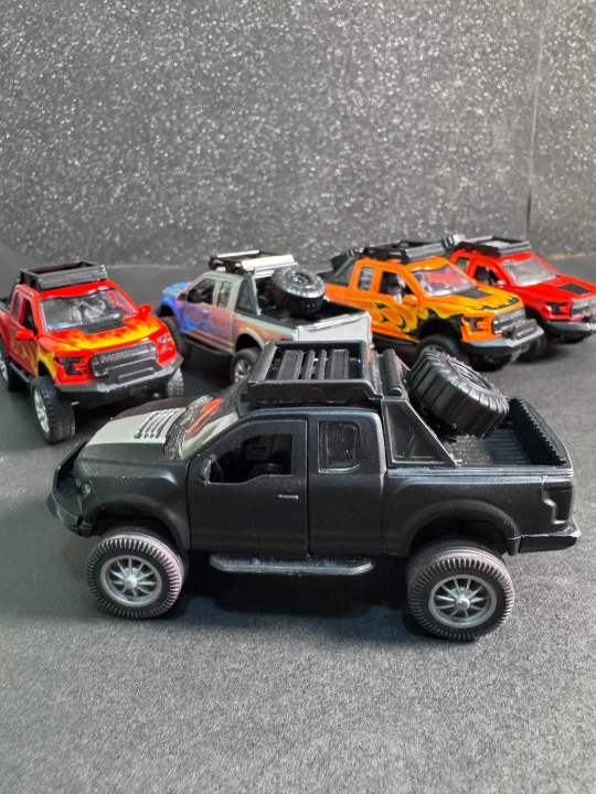 1:32%20Die%20Cast%20Toyota%20Hilux%20Pickup%20Model%20Toy%20%E2%80%93%20White%20%7C%20Pull%20Back,%20Opening%20Doors,%20Metal%20Bod%20-%20Image%207