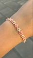 Flower beaded bracelet pack of one with ring. 