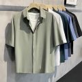 2024 New Summer Men Short-sleeved White Shirt Anti-wrinkle Solid Color Fashion Casual Loose Button Pocket Shirt Clothing Top. 