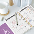 TREES Notebook Promotion 2026-2027 A5 Weekly & Monthly Planner ,Gold coil binding, purple minimalist notebook. 