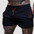 2026 Summer Gym Fitness Men's Shorts Woven Sweatpants Thin Fashion Men Marathon Running Shorts Sports Breathable Training Pants.