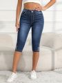 Women Slim-Fit Capri Denim Jeans Button Pockets Zipper Casual Style Denim Pants Fashionable Deep Blue Denim Calf-Length Pants. 