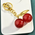 Cherry Keychain Charm Shiny Resin Metal Bag Accessory Elegant for Women Purse or Handbag Decoration.