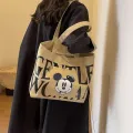 Disney Large Capacity Canvas Bag Women's 2024 New Trendy Cartoon Mickey Tote Bag College Student Class Shoulder Tote Bag. 
