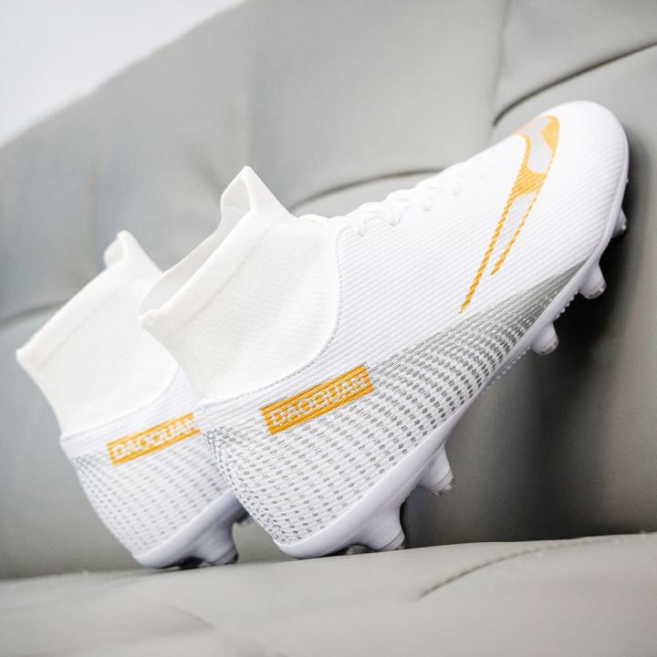 Premium%20high-top%20football%20shoes%20FG%20long%20studs%20and%20TF%20short%20studs,%20suitable%20for%20both%20men%20and%20women,%20offer%20comfort.%20Sole%20spikes%20-%20Image%203