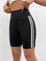 High Stretch Plus Size Athletic Shorts for Women Sporty Knit Mid Thigh Pants with Side Stripes Fashionable and Comfortable Pants.