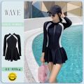Women’s Long Sleeve Swimsuit with Skirt and Attached Shorts. 