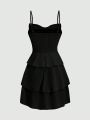 Fashionable women's waist cinched three-layer ruffle edge bow suspender dress. 