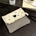 Cute floral sanitary napkin storage bag, female large capacity student portable handheld storage bag for going out. 
