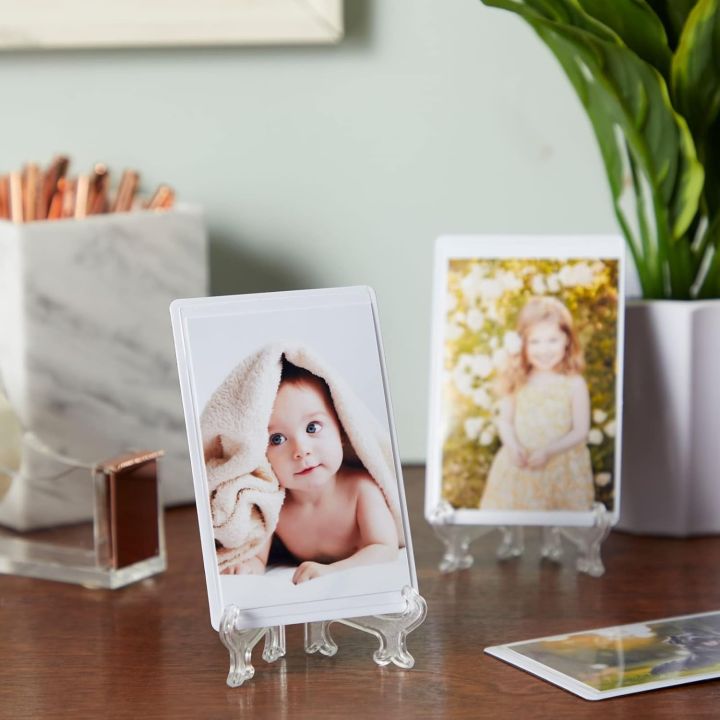Plastic%20Acrylic%20Easels%20or%20Stand/Plate%20Holders%20to%20Display%20Pictures%20or%20Other%20Items%20at%20Weddings,%20Home%20Decoration,%20Birthdays,%20Tables%20-%20Image%204