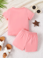 0-3 year old baby girl round neck short sleeved cute cartoon cat pattern top simple shorts two-piece set for spring and summer. 