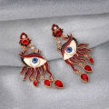 A Fashionable and Creative Red Devil's Eye Red Earrings. 