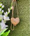 Mini heart metal clutch. 
