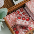Creative strawberry fruit shaped candles wedding ceremony with hand shooting props decoration. 