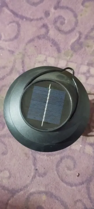 Dc%20bulb%2012%20volt%20charged%20from%20sunlight%20having%20their%20own%20solar%20panel%20on%20head%20-%20Image%204