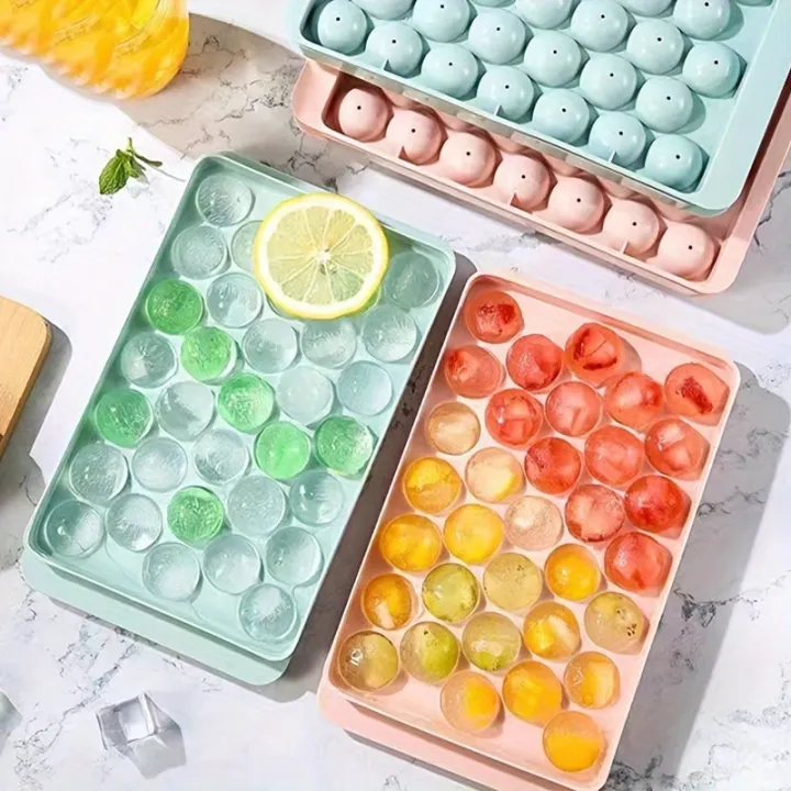 Ice%20Cube%20Trays%2033%20Grid%20Round%20Ice%20Ball%20Maker%20Mold%20for%20Freezer%20%7C%20Leak-Proof,%20BPA-Free%20Round%20Ice%20Cube%20Tray%20for%20Whiskey,%20Cocktails,%20Juice%20&%20Cold%20Beverages%20%7C%20Easy-Release%20&%20Reusable%20Ice%20Mould,%20Multiple%20Quantity%20Ice%20Ball%20Mold%20Set,%20Small%20Size%20-%20Multicolor%20-%20Image%202