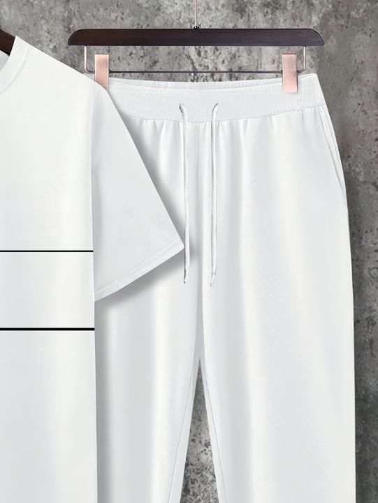 A%20new%20white%20casual%20men's%20set%20for%20summer%202025%20featuring%20a%20cool%20and%20breathable%20street%20T-shirt%20and%20long%20pants%20-%20Image%205