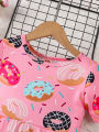 Pink cute donut full print short sleeved round neck girl's dress. 