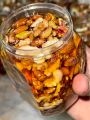 Mix crunchy dry fruit with  honey 500g Jar. 