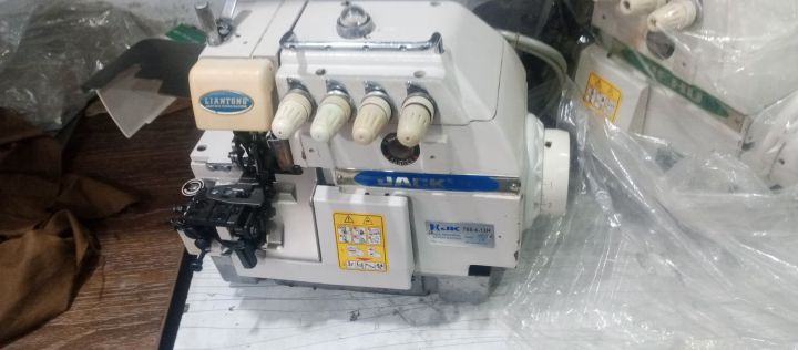 jack industrial atuo over lock sewing machine