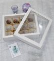 pack of 12 Chocolate coated Khajoor filled with Almond Walnut Cashewnut dry fruits. 