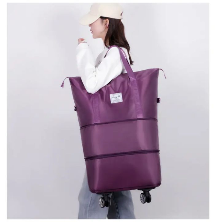 Trolley%20Large%20Capacity%20Folding%20Travel%20Bag%20%7C%20luggage%20bag%20with%20wheels%20Lightweight%20Waterproof%20Carry%20on%20Luggage%20Bag%20with%20Fixed%20Strap%20%7C%20Dry%20and%20Wet%20Separation%20Foldable%20Travel%20Duffel%20Bag%20-%20Image%202
