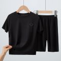 Children's Pajamas Summer Thin Short Sleeve Shorts Ice Silk Big Children Boys Girls Home Wear Set Summer.