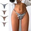 Leopard print women's thongs, zebra print python print low-rise bikini panties. 