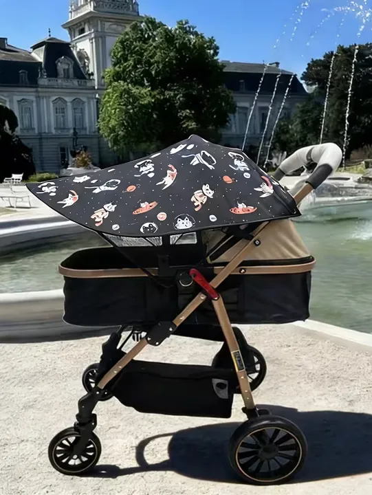 Universal%20Sunshade%20for%20Multiple%20Baby%20Models,%20Sun%20Protection%20and%20Light-Blocking%20Cover%20for%20Baby%20Travel,%20Foldable%20and%20Breathable,%20Cartoon%20Print%20Ins%20Style%20-%20Image%203
