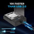 USB 3.0 to SATA External Hard Drive Lay-Flat Docking Station (model EC-DFFN or similar) with a WUSB 3.0 to SATA External Hard Drive Lay-Flat Docking Station (model EC-DFFN or similar) with a W-t-ern Digestern Digital (W-D) Green 14TB hard drive inserted. .