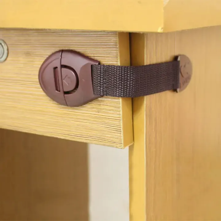 Baby%20Safety%20Cabinet%20Locks%20&%20Straps%20-%20Child%20Proof%20Drawer%20Lock%20for%20Refrigerator,%20Cupboard%20&%20Door%20-%20Multi-Purpose%20Kids%20Security%20Protection%20for%20Home.%20-%20Image%202