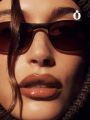 Rhode “The Peptide Lip Tint" shade number Espresso. 