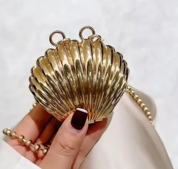 Mini%20Shell%20metal%20clutch%20Perfect%7C%20Mini%20Shell%20metal%20clutch%20%7C%20HARD%20Metal%20Silver%20Bag%20Unique%7C%20%E2%80%8BMetallic%20Shell%20Clutch%7C%20The%20Luminous%20Seashell%20Statement%20Clutch%20&%20Crossbody%20Bag%20%E2%9C%A8%7C%20Introducing%20the%20exquisite%20Shell%20Clutch%20Evening%20Bag,%20a%20fusion%20of%20elegance%20-%20Image%203