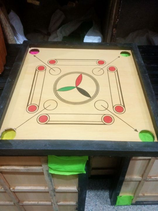 18,inch%20Wooden%20Carrom%20Board%20Game%20With%20Striker%20and%20Coins%20Set%20-%20Image%202